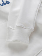 White Dior hoodie sleeve cuff with ribbed knit trim