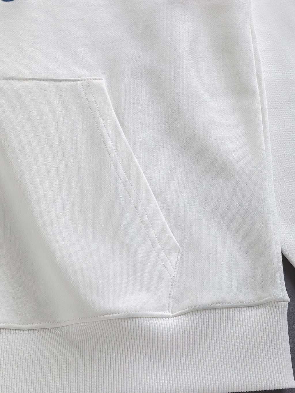 White Dior hoodie sweatshirt with pocket hem and stitched seams