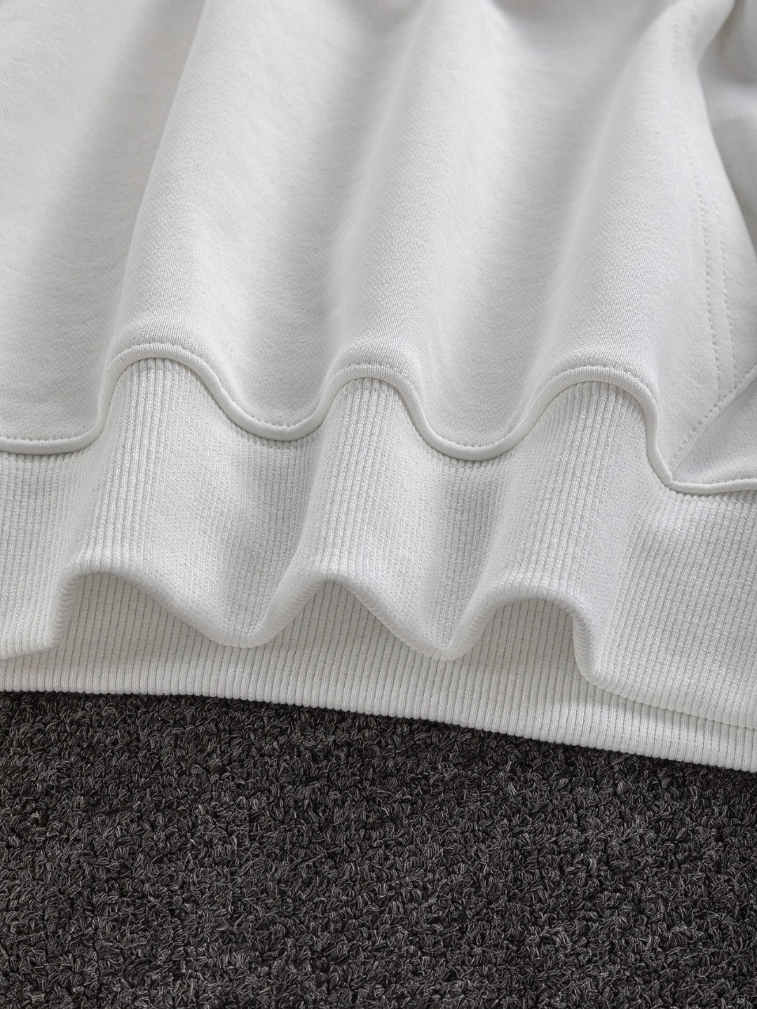 White Dior hoodie ribbed hem with scalloped fabric edge