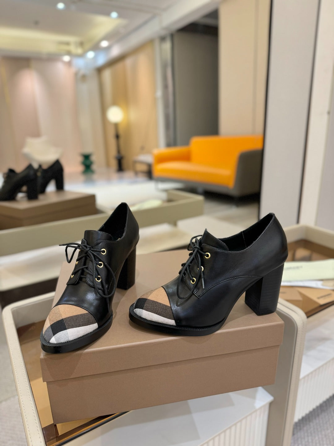 Black lace-up ankle high heels with beige check toe panel and block heel