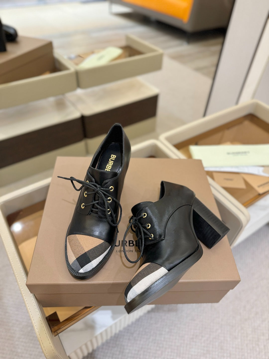 Black lace-up high-heel shoes with Burberry logo on insole