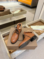 Burberry lace-up leather shoes, tan, beige collar, black sole and laces.
