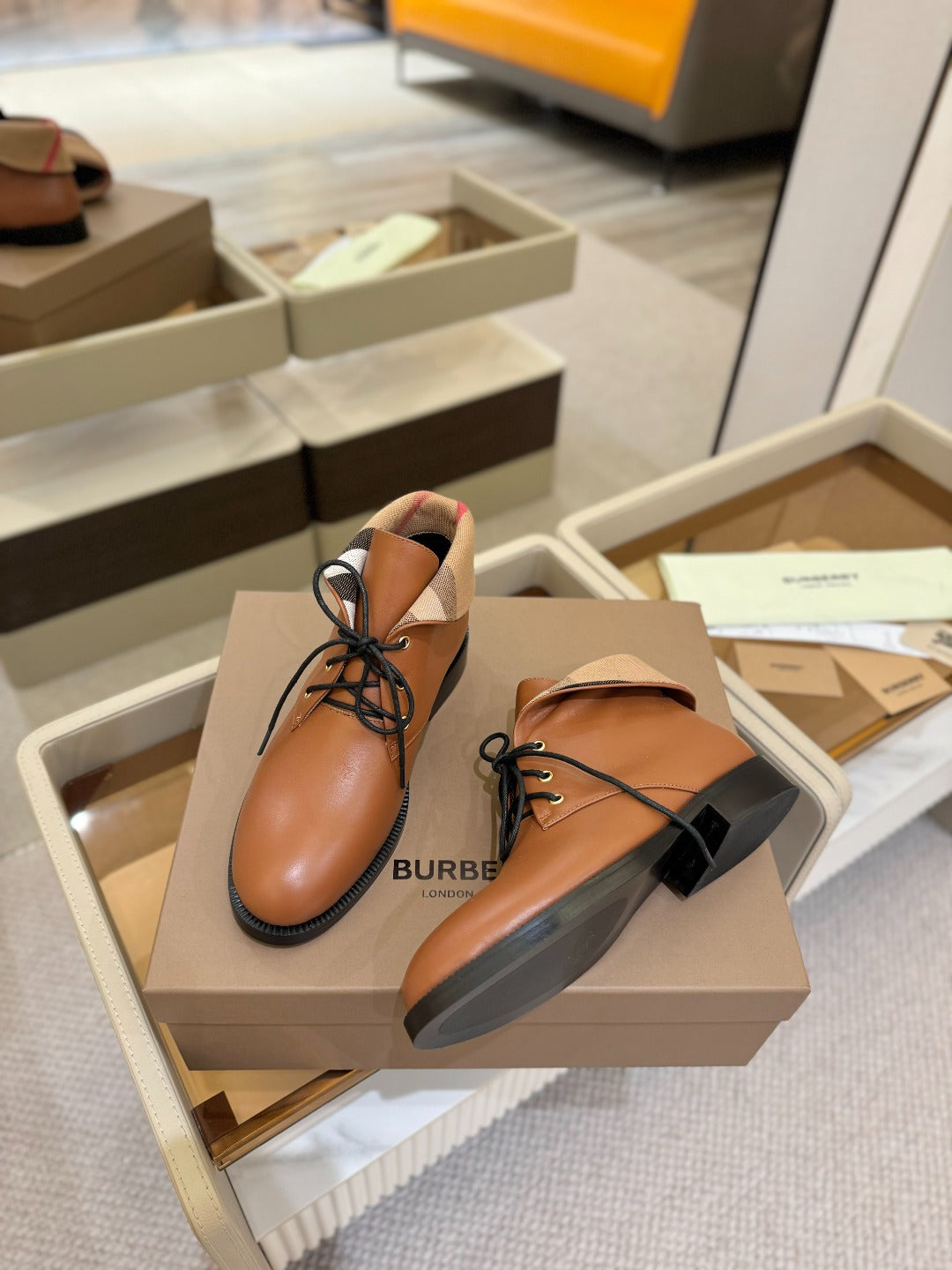 Burberry lace-up leather shoes, tan, beige collar, black sole and laces.
