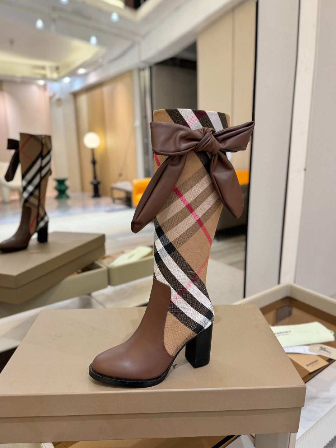 Burberry check-print heeled boots with brown bow at shaft