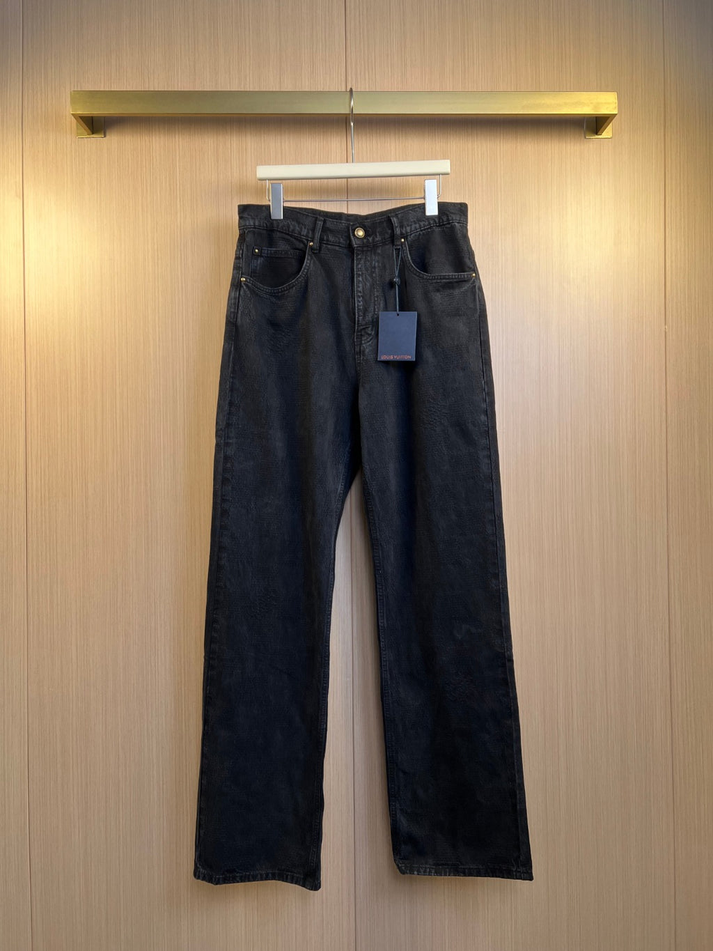 Louis Vuitton dark denim jeans with button fly and straight legs