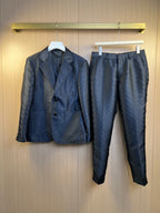 Navy blazer and matching trousers set, four-button front, notch lapels