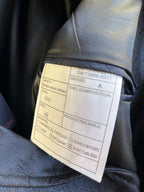 Blazer inside label card with size, grade, and production information