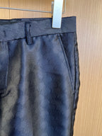 Louis Vuitton navy trousers waistband with belt loops and front pleat, monogram fabric.
