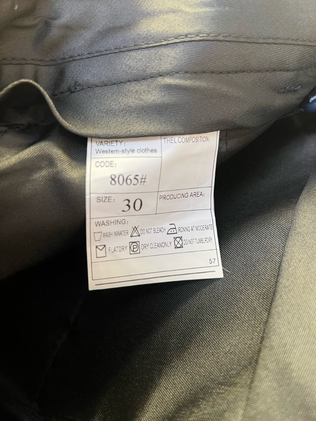 Louis Vuitton trousers inner care label, code 8065#, size 30.