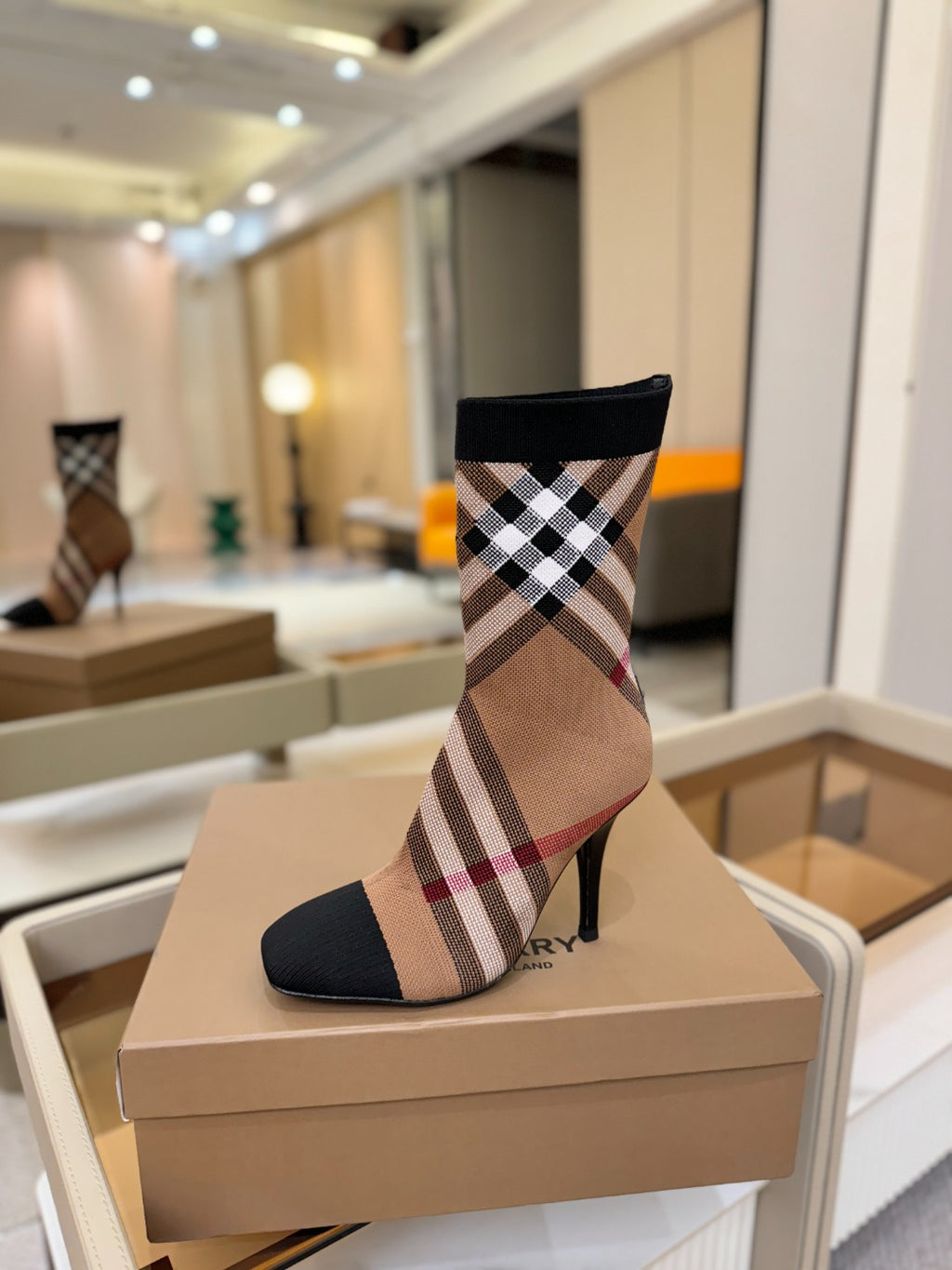 Burberry check knit heeled ankle boots with black sock cuff