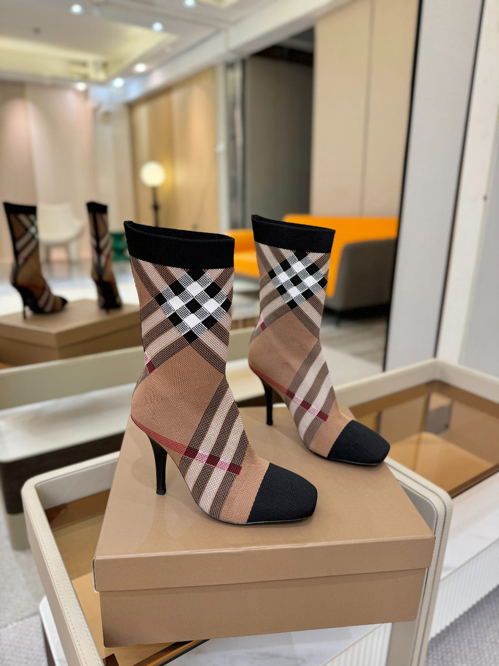 Burberry check knit heeled ankle boots, beige plaid with black toe and cuff