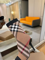 Burberry check knit heeled ankle boot close-up, beige plaid and black cuff