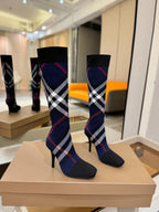 Knee-high knit boots with navy, red, and white check pattern and slim stiletto heel