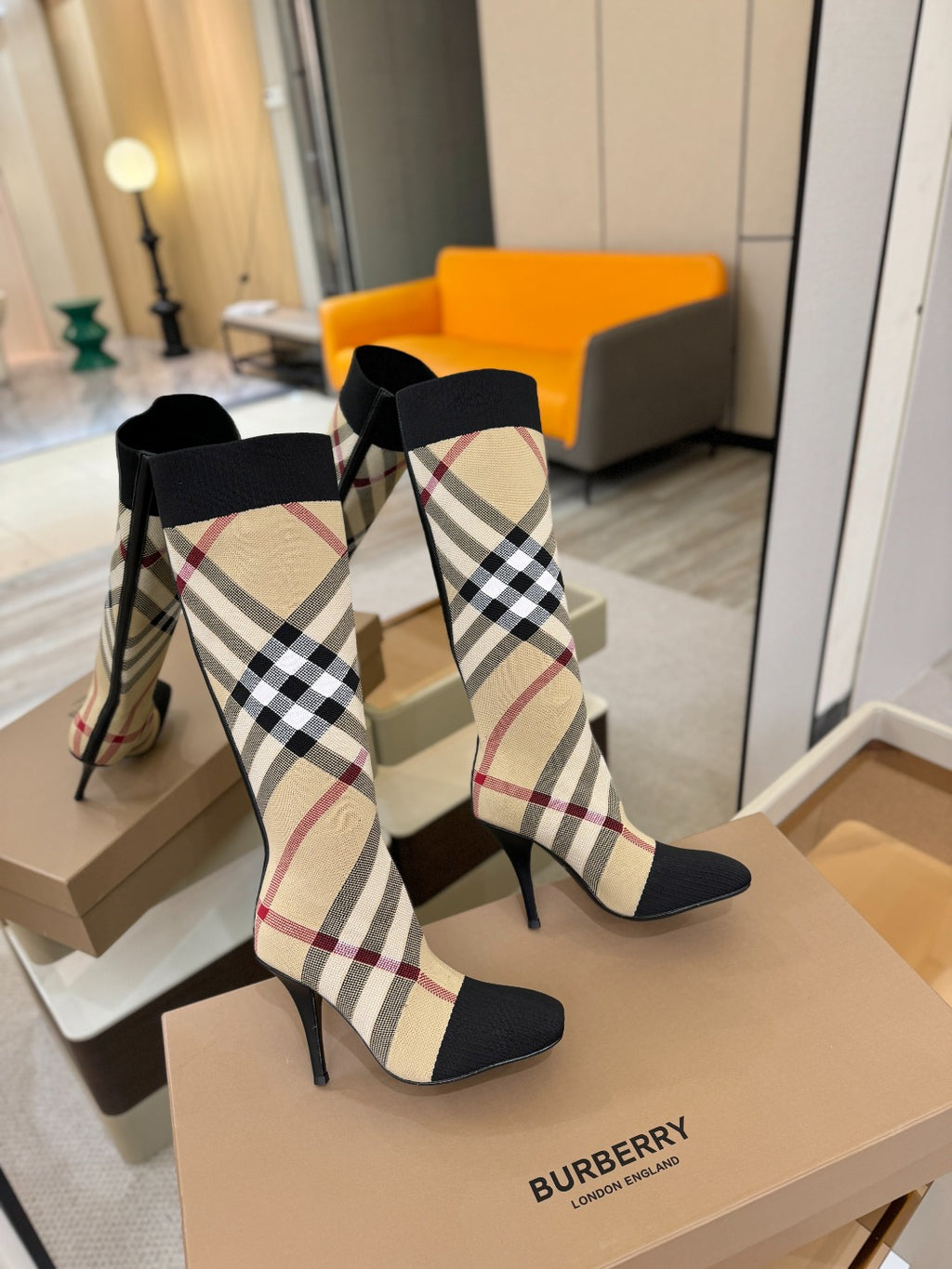 Tartan sock-style knee-high boots with black cuff and check design, slim stiletto heels