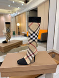 Tartan sock-style knee-high boots with black cuff and check pattern, slim stiletto heels
