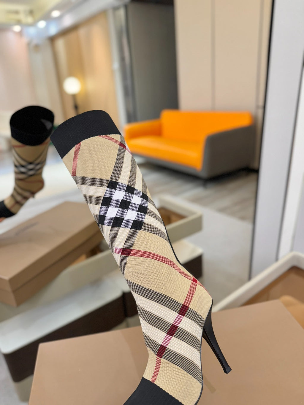 Tartan sock-style knee-high boot with black cuff and check stripe, slim stiletto heel