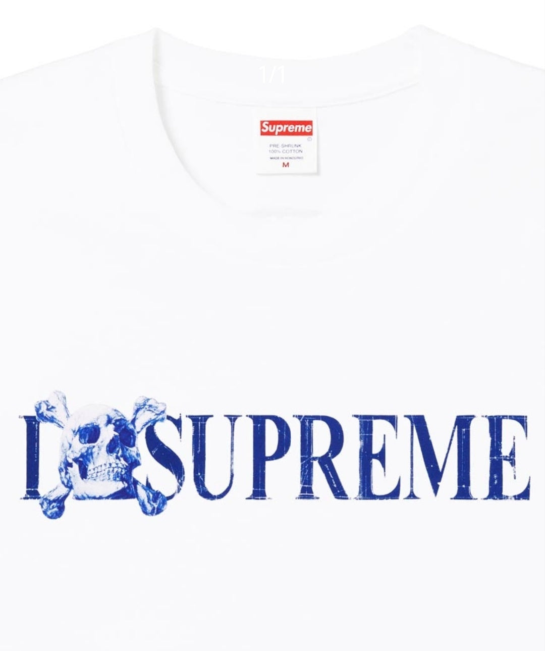 White crew-neck T-shirt with blue distressed SUPREME graphic
