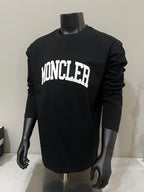 Black Moncler long-sleeve T-shirt front view with white MONCLER logo