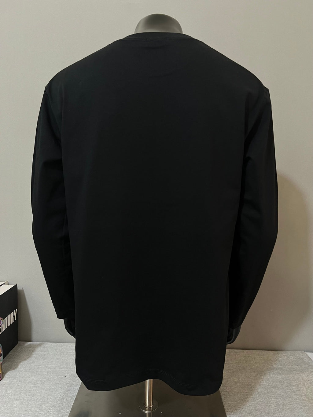 Black Moncler long-sleeve T-shirt back view on mannequin