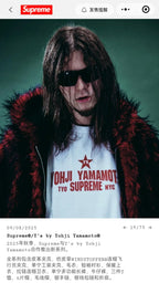 White graphic T-shirt with red YOHJI YAMAMOTO logo print on a person