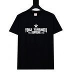 Black graphic T-shirt with white and red YOHJI YAMAMOTO logo print