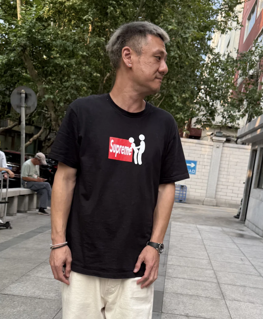 Stussy black T-shirt with Supreme logo graphic
