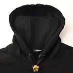 Versace black hoodie neckline with gold crest and zipper pull