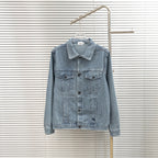 Burberry long denim jacket with button front, pointed collar, and chest flap pockets