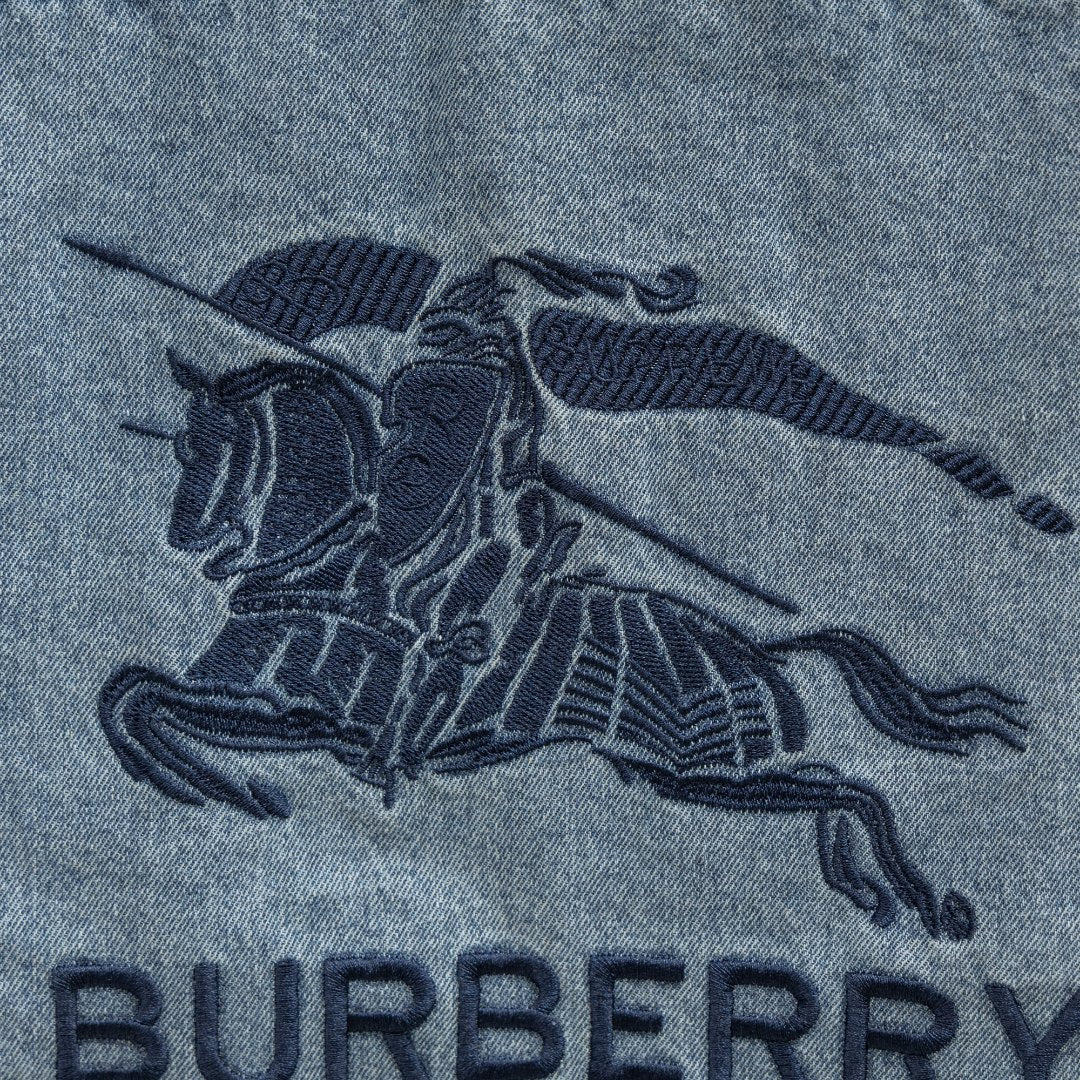 Light blue denim jacket graphic print with dark accents