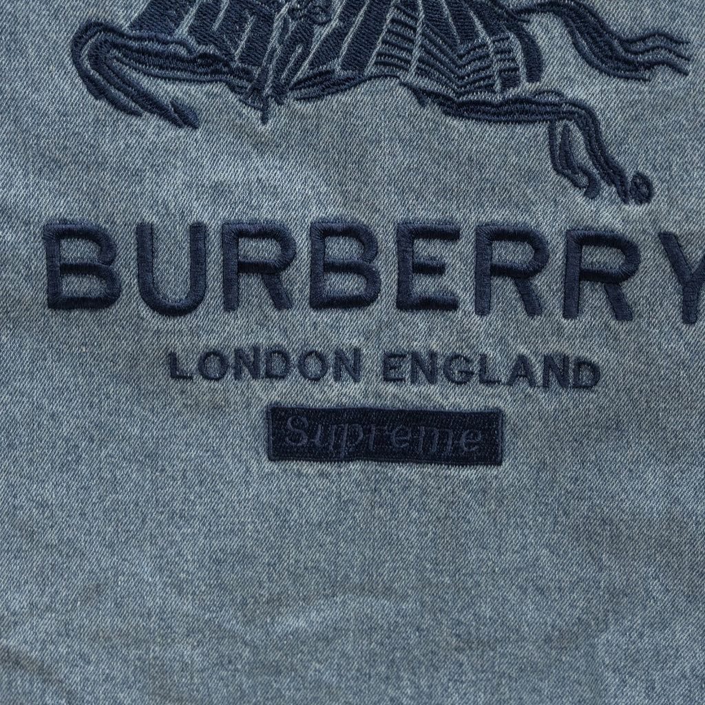 Light blue denim jacket logo text: BURBERRY LONDON ENGLAND
