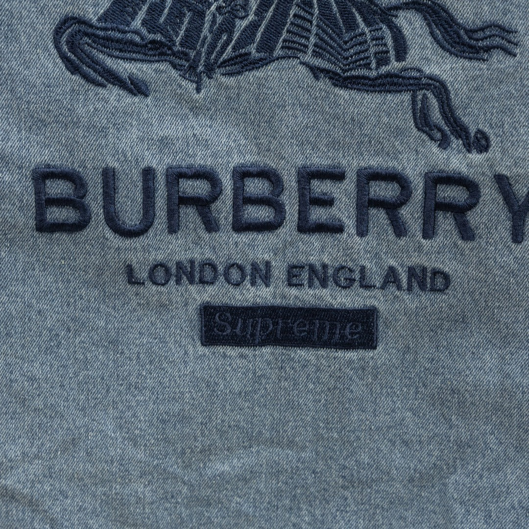 Light blue denim jacket logo text: BURBERRY LONDON ENGLAND
