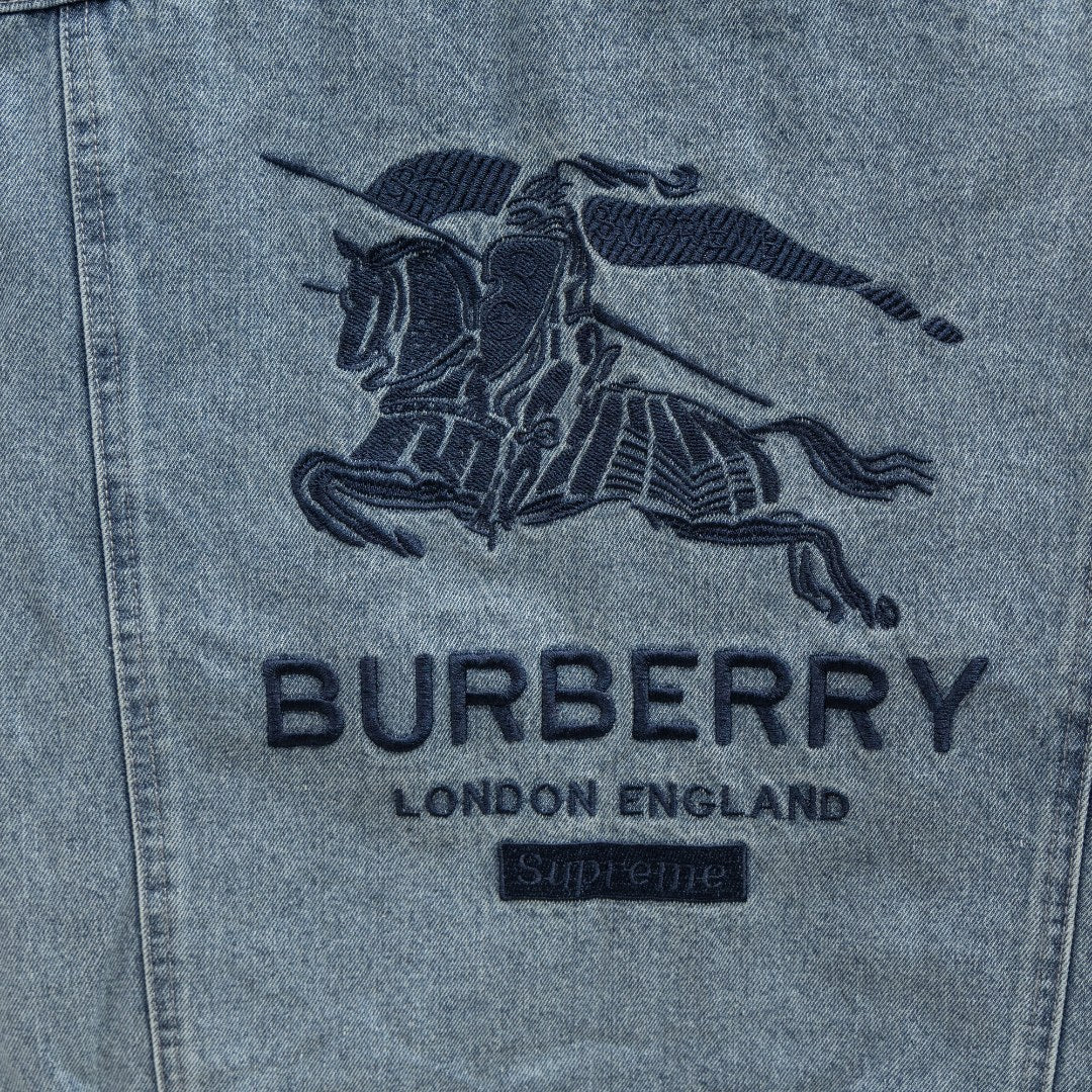 Light blue denim jacket back graphic with Burberry logo and text
