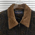 Louis Vuitton denim jacket neckline with tan corduroy collar and logo label close-up