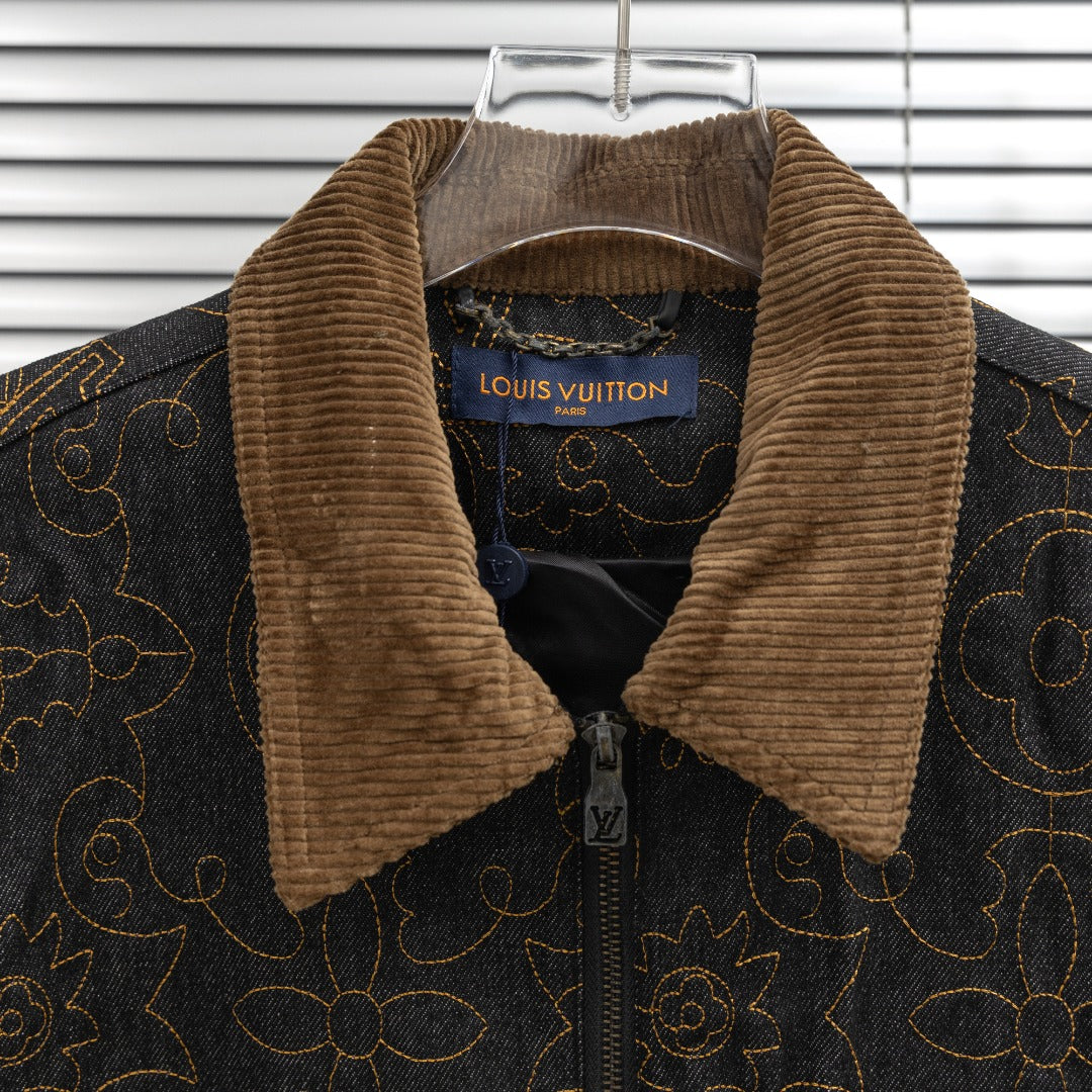 Louis Vuitton denim jacket neckline with tan corduroy collar and logo label close-up