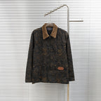 Louis Vuitton long denim jacket with tan corduroy collar and gold logo pattern
