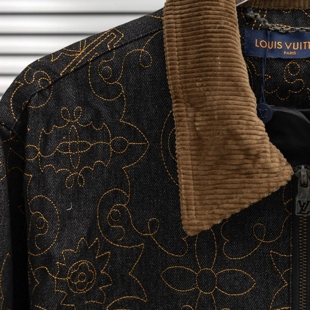 Louis Vuitton denim jacket shoulder detail with tan corduroy collar and gold pattern
