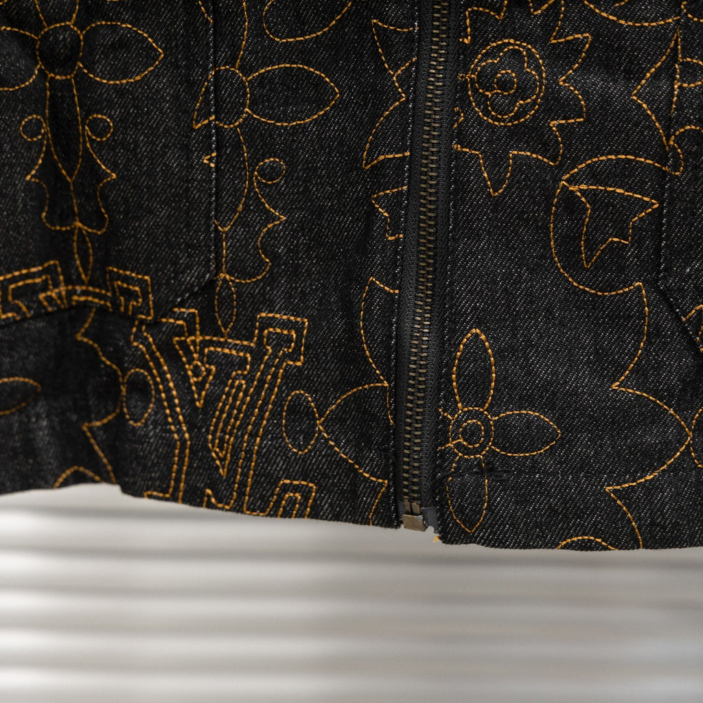 Louis Vuitton long denim jacket zipper and gold logo pattern detail