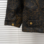 Louis Vuitton denim jacket sleeve with gold buttons and floral embroidery