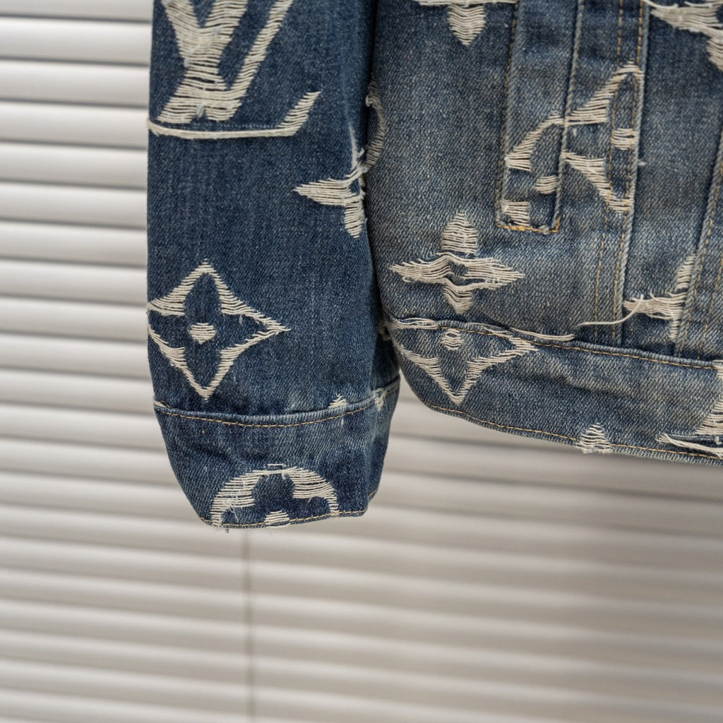 Denim jacket sleeve with Louis Vuitton monogram print, cuff hem and distressing