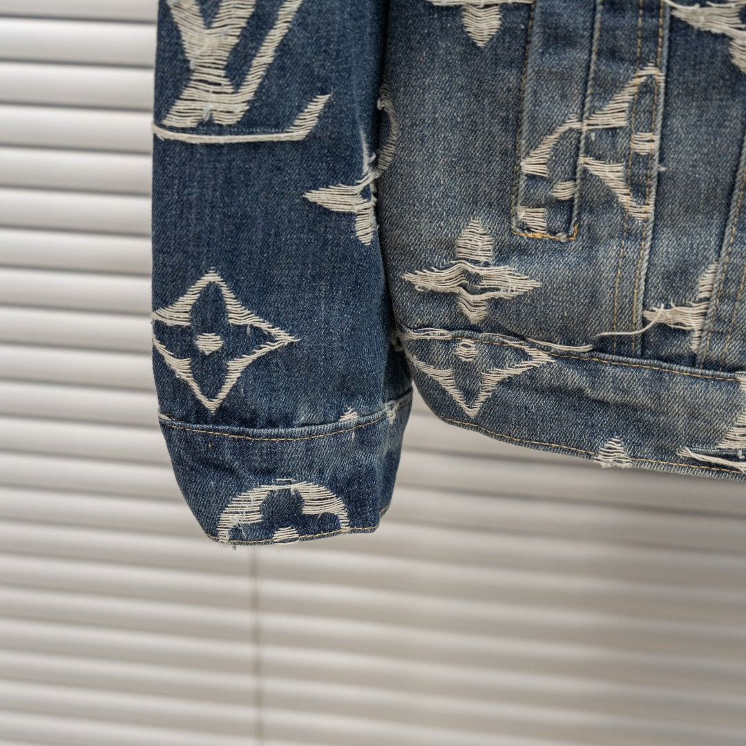 Denim jacket sleeve with Louis Vuitton monogram print, cuff hem and distressing