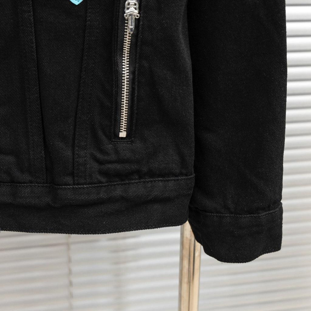 Black denim jacket lower side with front zipper and hem