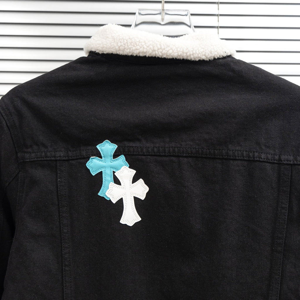 Black denim jacket with sherpa-lined collar and cross patch at back