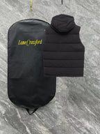 Black long padded vest with hood and horizontal quilting