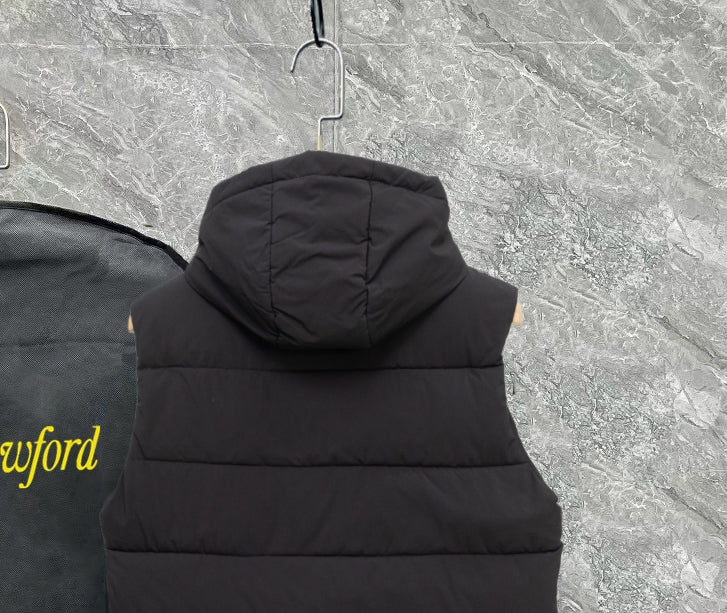 Black hooded padded vest with gathered hood
