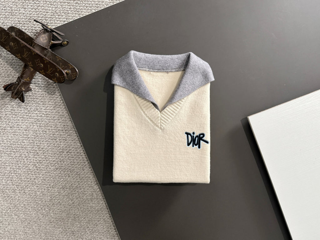 Cream sweater front with light blue ribbed collar and Dior logo