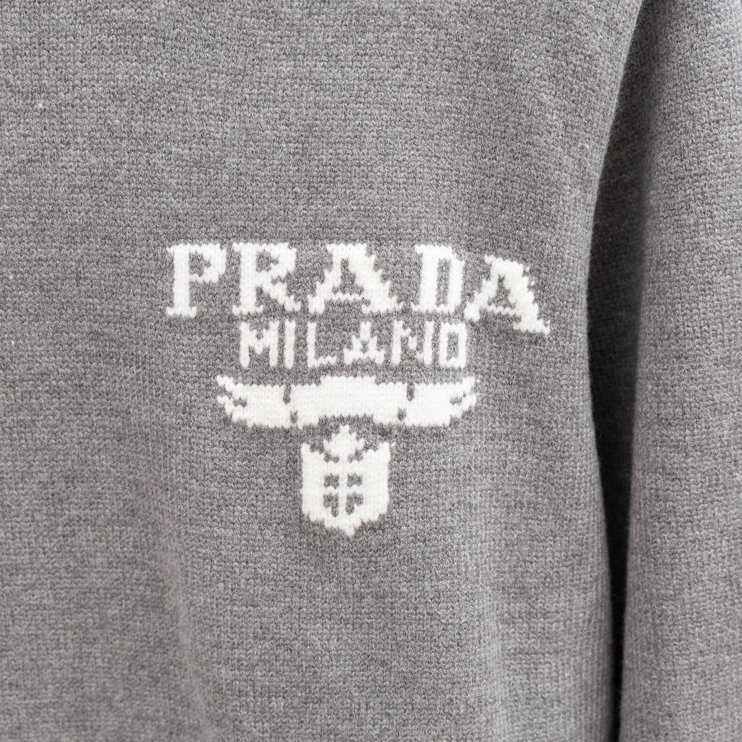 PRADA Milano logo on heather gray Prada knit sweater, with embroidered-style graphic.