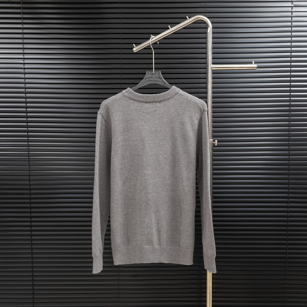 Prada long-sleeve sweater in heather gray with crew neck and ribbed cuffs.