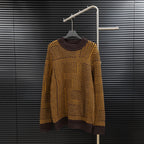 Long-sleeve sweater with dark turtleneck and brown/yellow geometric knit pattern