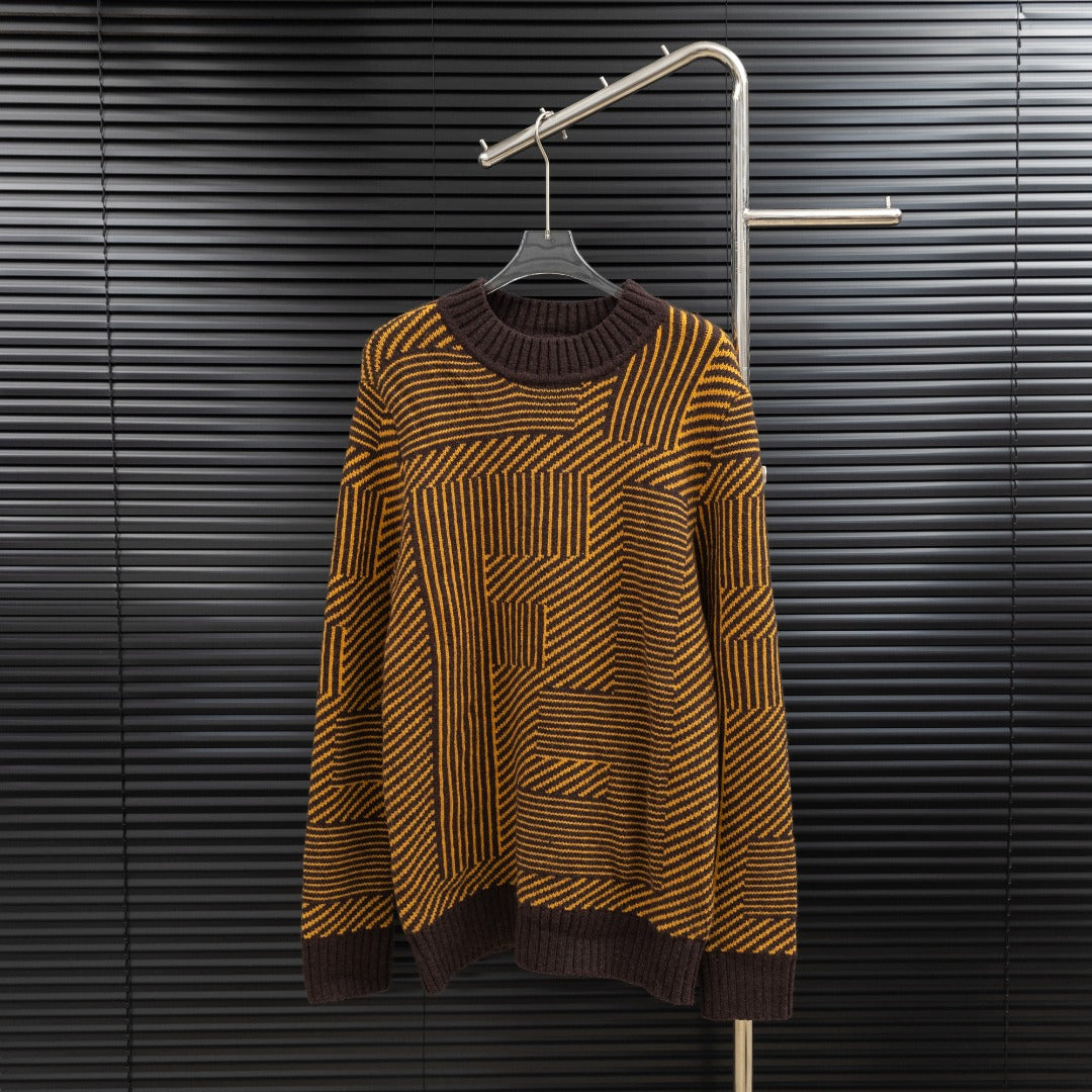 Long-sleeve sweater with dark turtleneck and brown/yellow geometric knit pattern