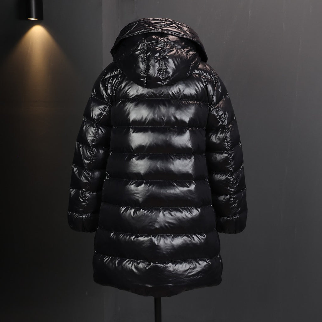 Long puffer coat with attached hood; horizontal quilted baffles and shiny black fabric
